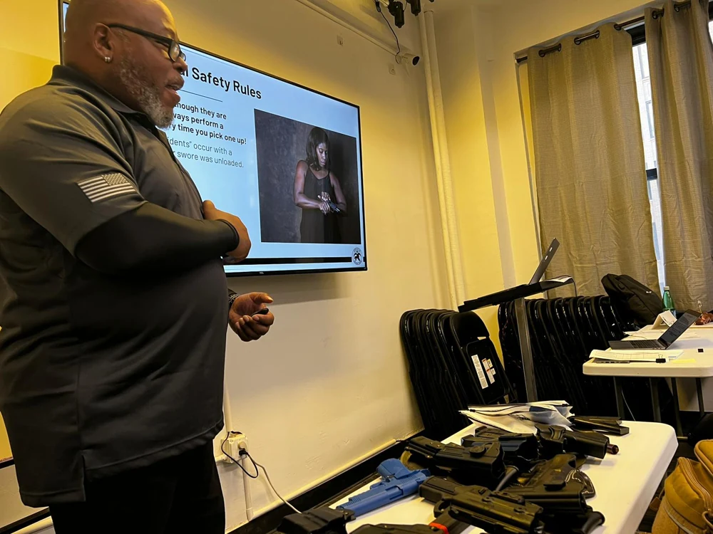 Damon Wright leading a firearms safety lesson in the classroom